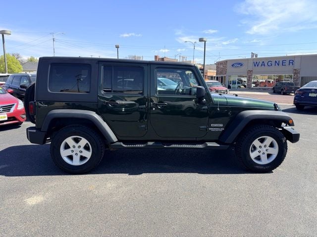 Used 2010 Jeep Wrangler Unlimited Sport with VIN 1J4BA3H14AL229750 for sale in McCook, NE